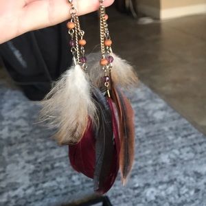 Maroon feather dangly earrings